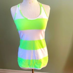 Lululemon tank top. White/neon lime green stripe. Size 10/12.